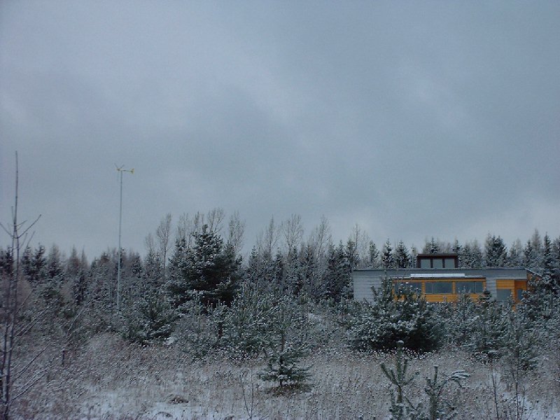 The new wind turbine system fits in with surrounding trees.