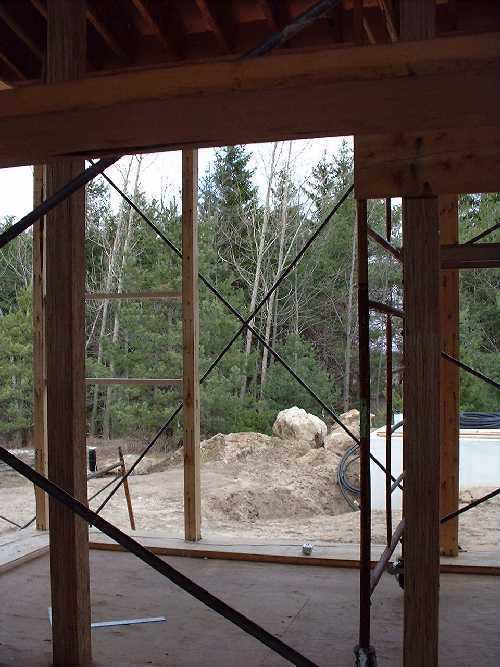 Near a corner the steel cross bars provide extra strength for the high walls on the north wall. A windows frame can also be seen at the far left.