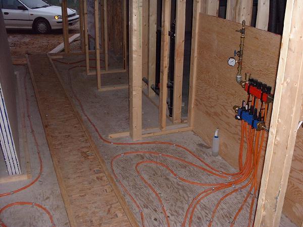 Most of the insulation and drywalling has been completed. The north part of the in-floor heating system is now being installed on the ground floor and will also be installed on the 2nd floor on the so