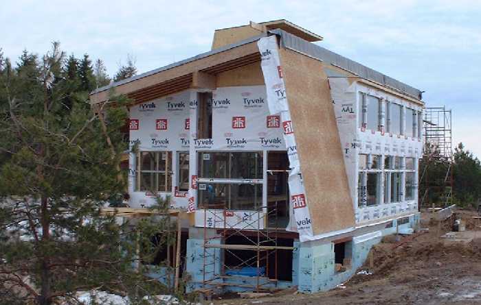 South facing windows will be set off by zinc on the steeply sloped roof to either side. The zinc will be applied directly onto the plywood, which covers the EPDM waterproofing.