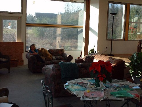 Claire relaxes after and afternoon of painting with here Dad.