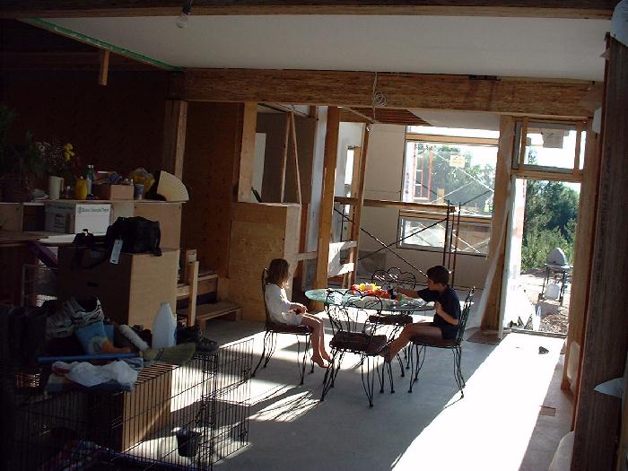 The breakfast table provides a sunny place for the kids to play teddy bear football. The greenhouse windows, newly finished with a reveal, drywall and blonde visa plywood separators allows the morning