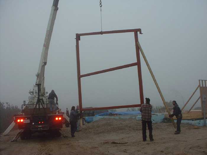 Framing around the master bedroom on the east side with steel. This was a cold and foggy morning.