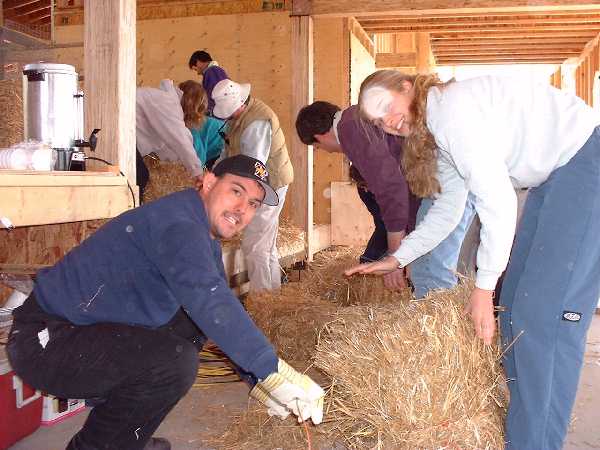 Dan and Alison create 1/2, 1/3, and 2/3 size bales for around doors and windows.