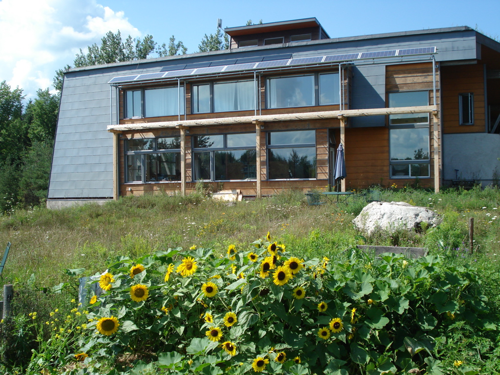 New solar awning is finally up and ready to produced electricity on the Ontario RESOP (renewable energy standard offer program). This program pays us 42 cents/kW for every kW these panels produce. The