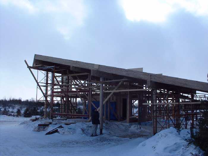 The civil engineer inspects the post.