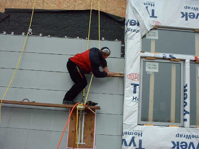 After heating the Zinc to prevent cracking, Jonathan uses special tools to secure the Zinc.
