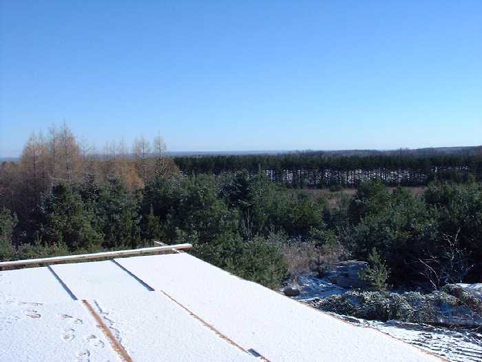 Looking at the view from the middle bedroom, south east into the property of our neighbours to the south.