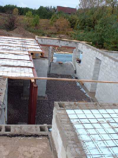 Looking west down into basement. The doorway on the far right leads to the future "cold room" where we will store food that needs to be kept cold.