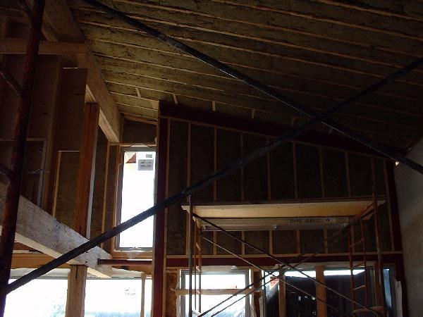 A double layer Roxul insulation with a combined value of R44 fills the roof and walls in most places. Roxul is a combination of steel slag and volcanic rock.