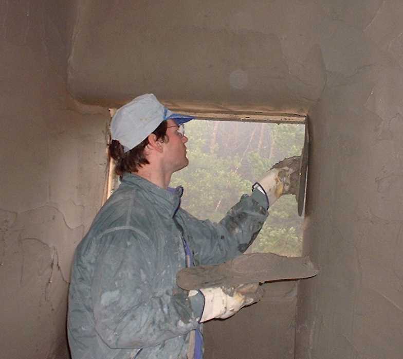 Pete trowels the only windows on the north side of the house..