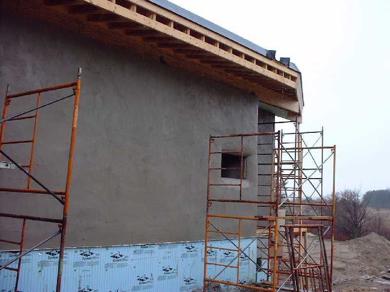 The newly plastered wall complete with sponge smoothing completed.
