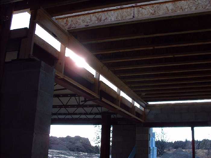 The ground floor on the south side is in. Martin has suggested we leave the opening through to the basement so that we get lots of natural light. Looks good at this stage.