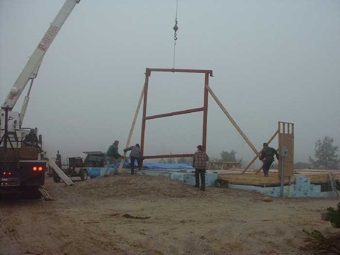 November 13 , 2000 - Positioning the frame and fastening to the foundation.